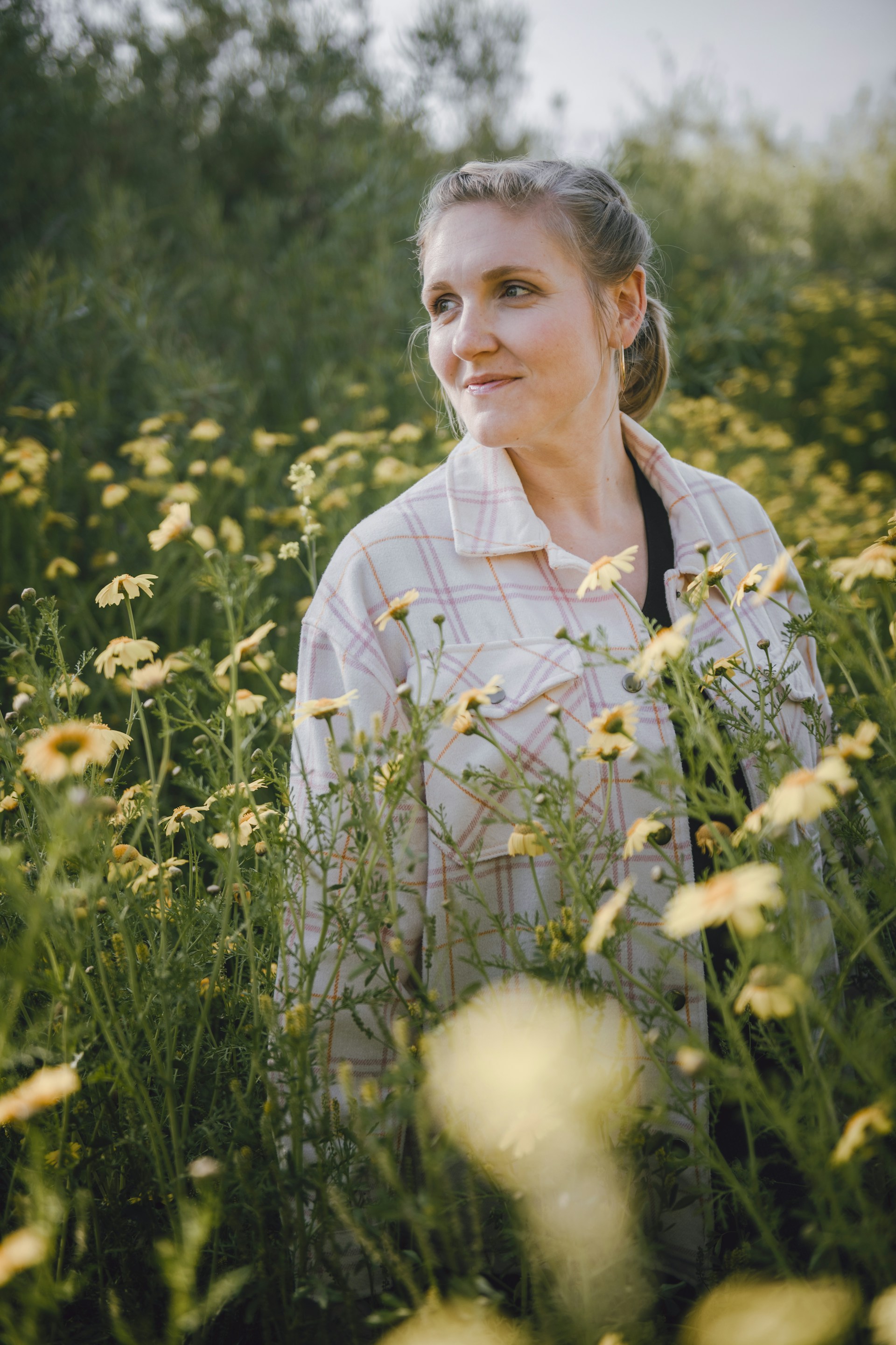Woman in a field of flowers